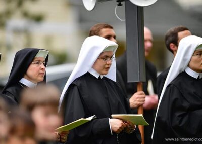 Sisters pray the rosary during Procession