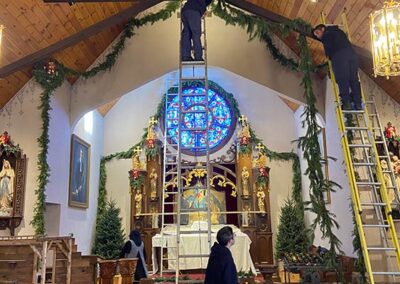 Brothers decorate garlands Christmas 2024