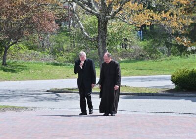 Brother Thomas and Bishop McManus arriving at IHM School