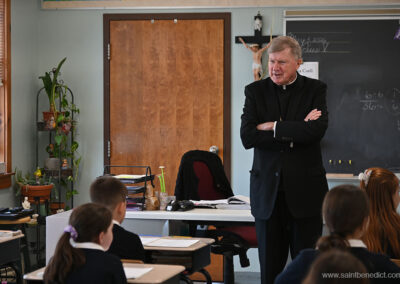 Bishop enjoys speaking with the students.