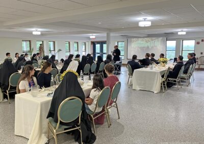 August 22 Luncheon in function hall.